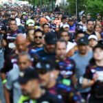 Corredores celebran participar en Medio Maratón de Zapopan